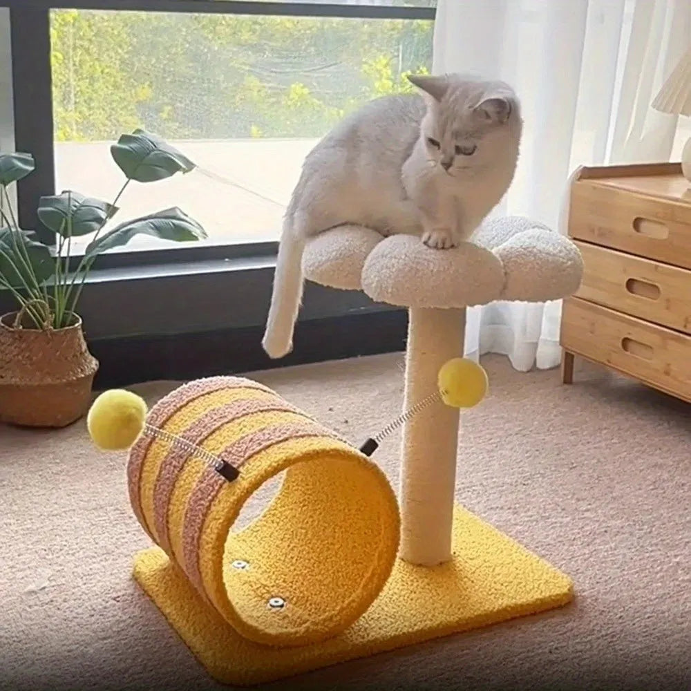 Yellow cat climbing frame with sisal scratching post and integrated tunnel.