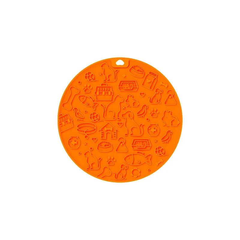 Round blue silicone pet licking mat with suction cup and textured surface for slow feeding.