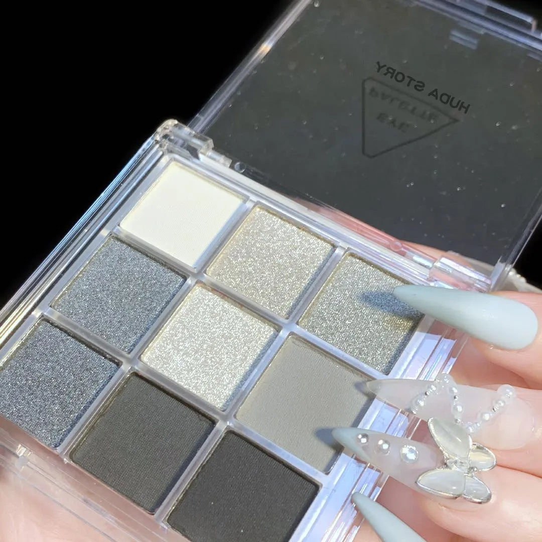 Smoked nine-colour eye shadow palette showing white, silver, black, and iron grey shades in CZ0069-9 compact
