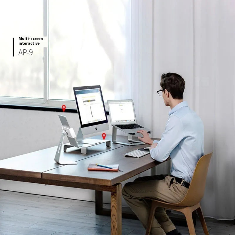 Aluminium laptop stand in black or silver with ventilation gap and foldable design