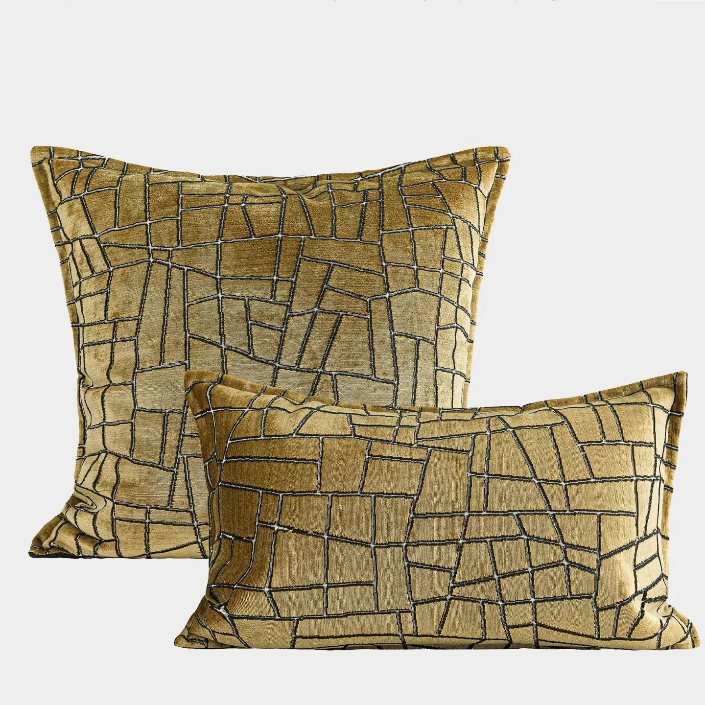 Gold geometric abstract pattern on square and rectangular polyester cushion covers.