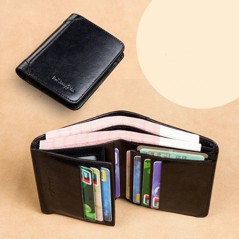 Men's black leather bifold wallet open to show internal card slots, photo window, coin pocket, and banknote compartment.