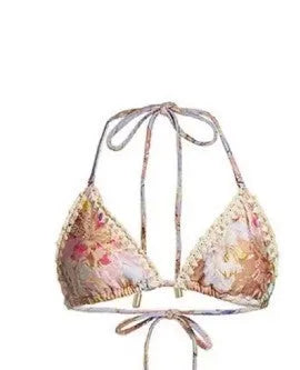Women's creamy white floral print bikini set with matching skirt for swimming