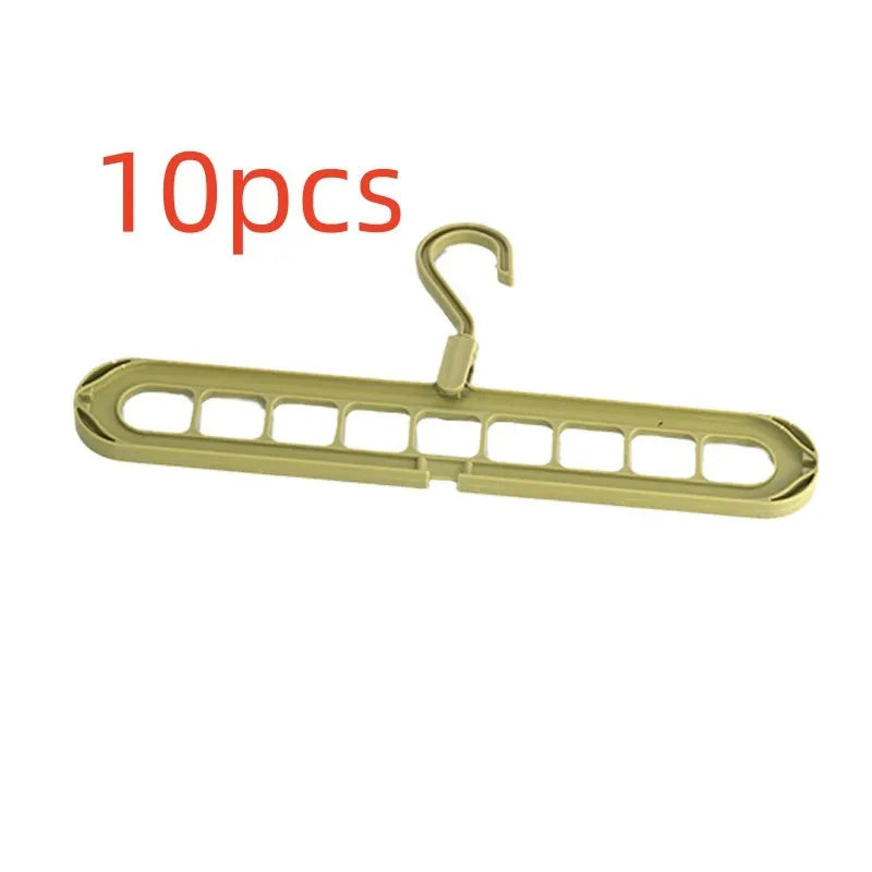 Green plastic nine-hole folding hanger for trousers displayed open and closed.