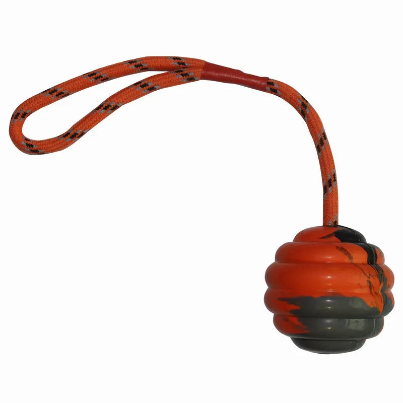 Multi-colour rubber dog ball toy with rope knot handle measuring 6x30cm