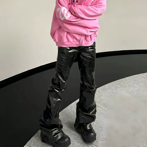 Black shiny patent leather coated skinny jeans with straight-leg design on cotton denim