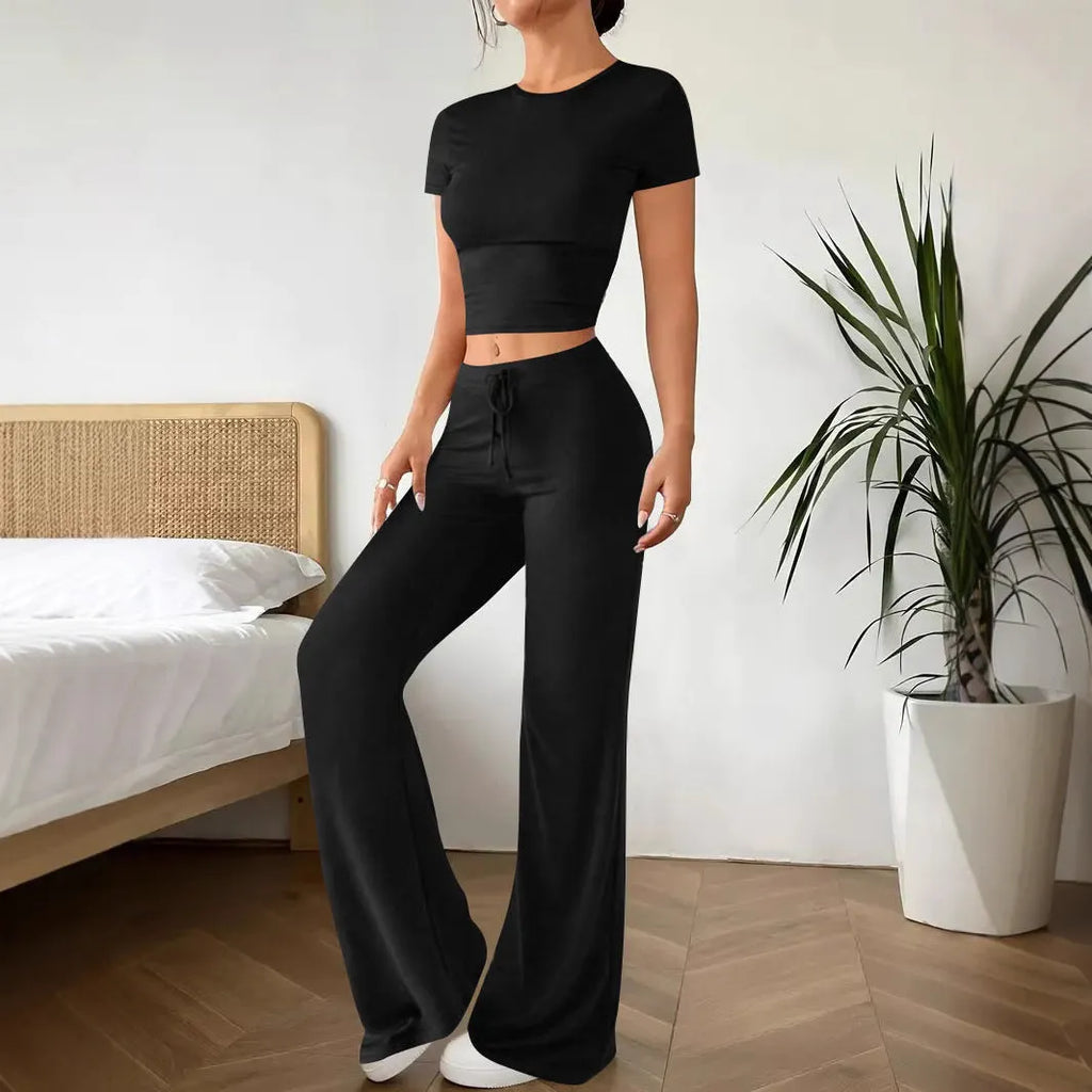 Black high waist polyester trousers with matching short sleeve t-shirt top women's suit set