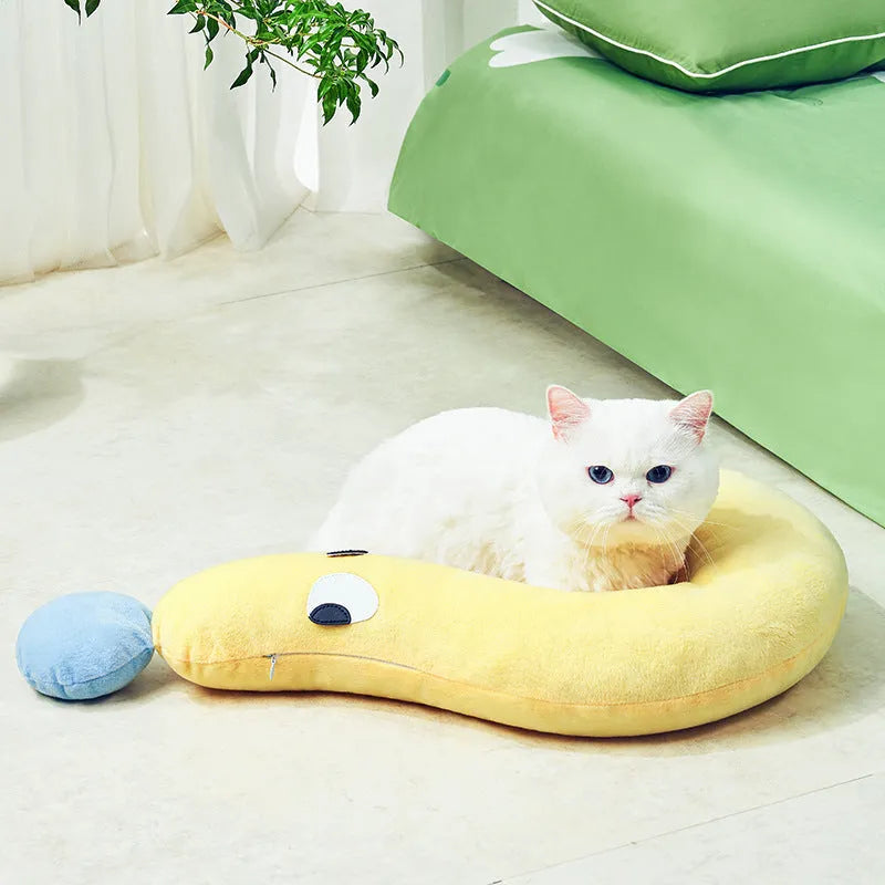 Blue or yellow rectangular pet sleeping pillow measuring 62cm by 39cm on a floor.
