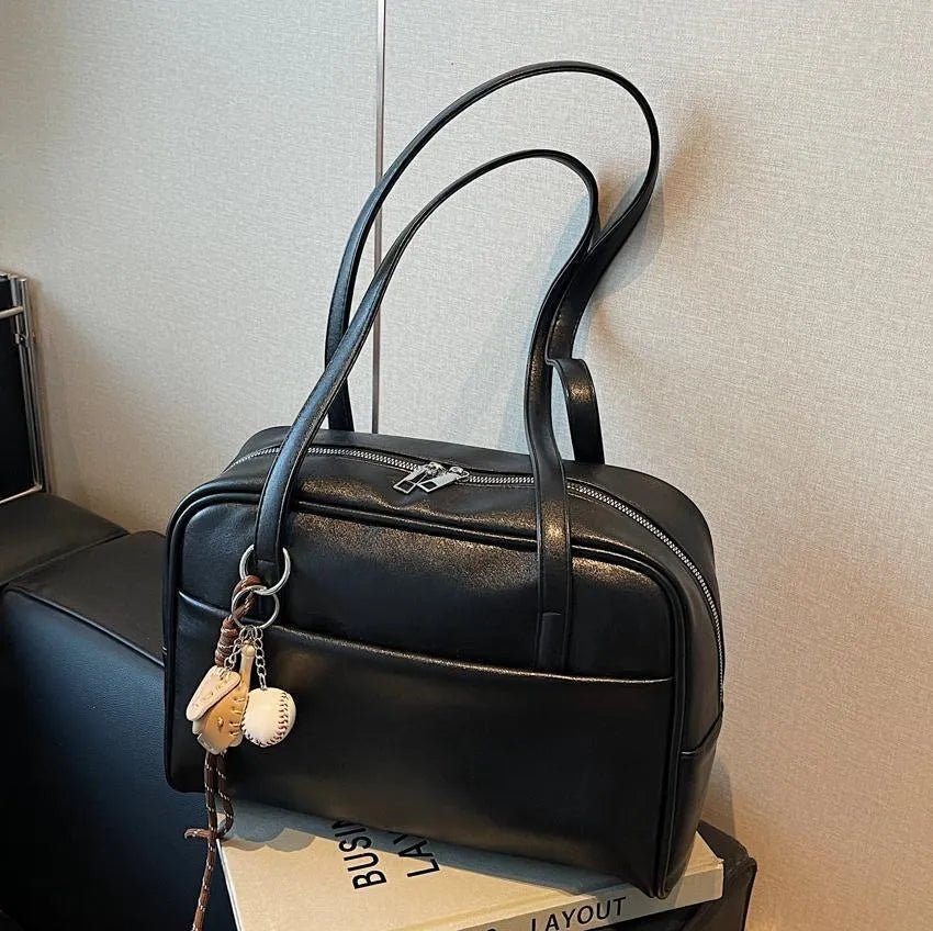 Women's urban simple PU bucket underarm bag with pendant detail in black, brown, coffee, and wine red colours.