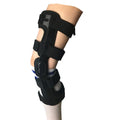 Black adjustable anterior ligament knee support with straps, shown on a leg.