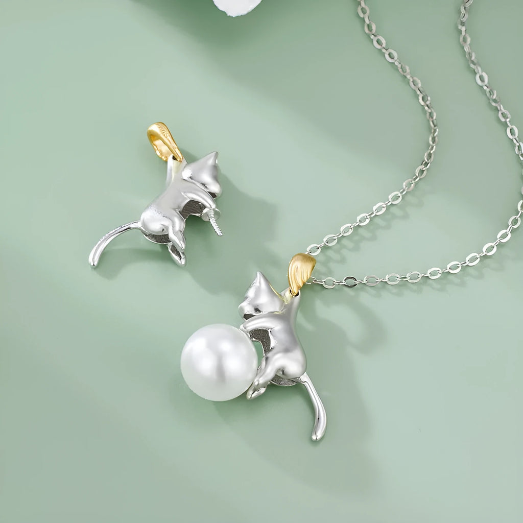 Sterling silver clavicle necklace with cat pendant on model, showing electroplated finish and professional styling