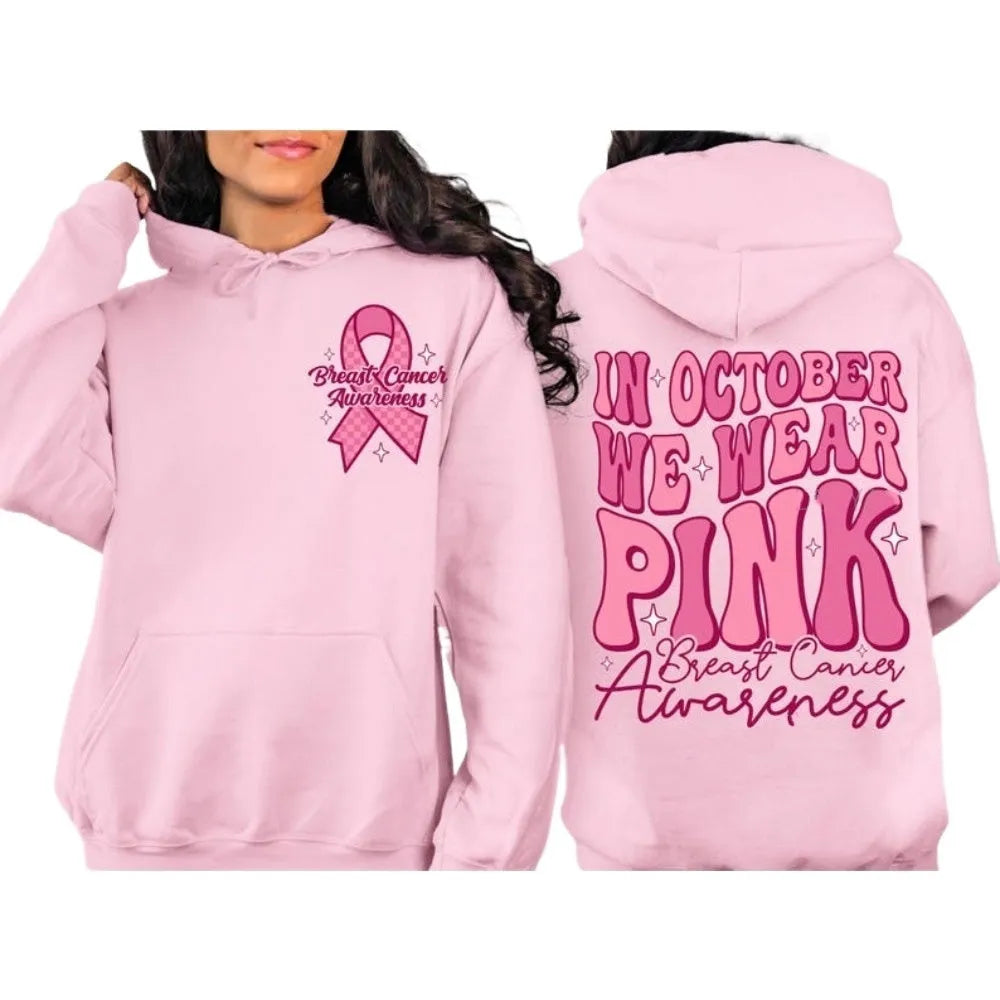 Breast Cancer Awareness pullover hoodie with retro art print and side seam pockets, shown in pink.