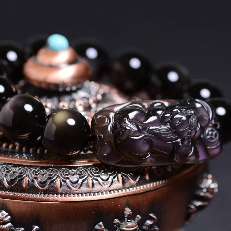 Polished icy obsidian crystal Pi Xiu bracelet with geometric beads in multiple sizes