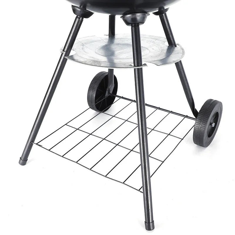 14-inch portable iron barbecue grill with modern minimalist design on a circular cooking surface