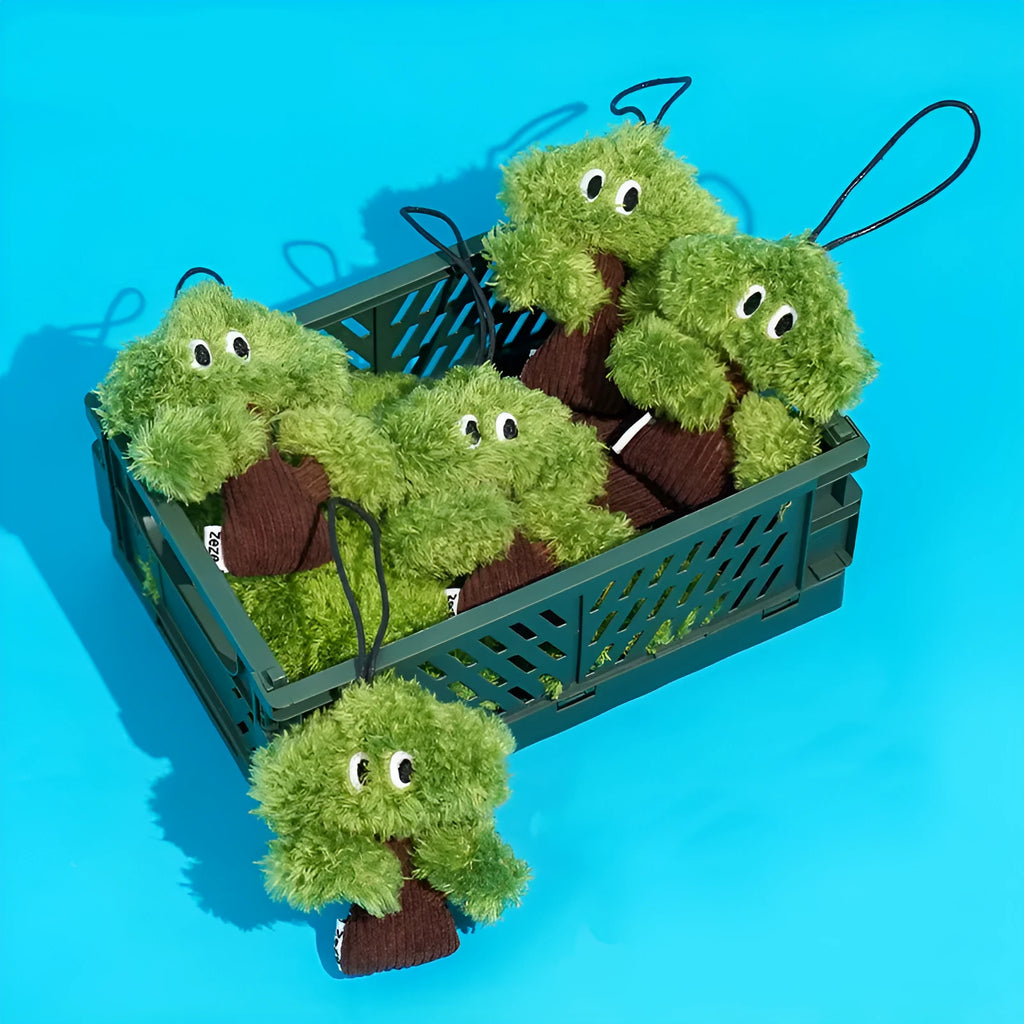 Pine tree shaped cat toy stick with an attached mint-scented bag pendant on a string.