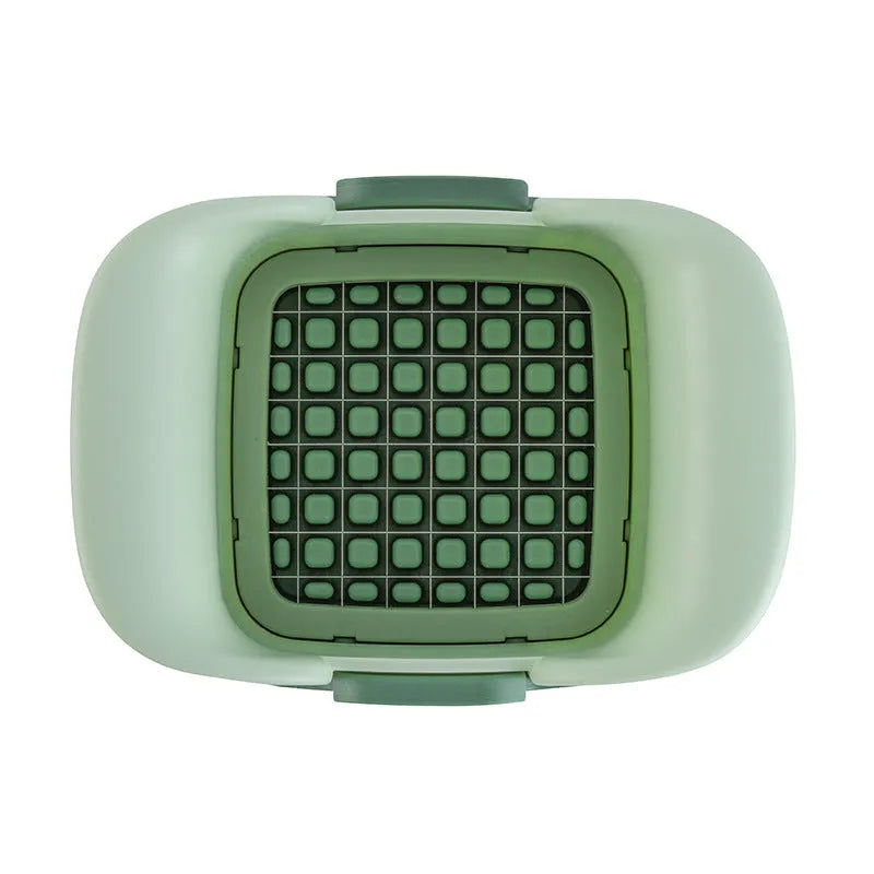 Green multifunctional vegetable chopper with hand pressure mechanism and stainless steel blade for slicing onions and potatoes