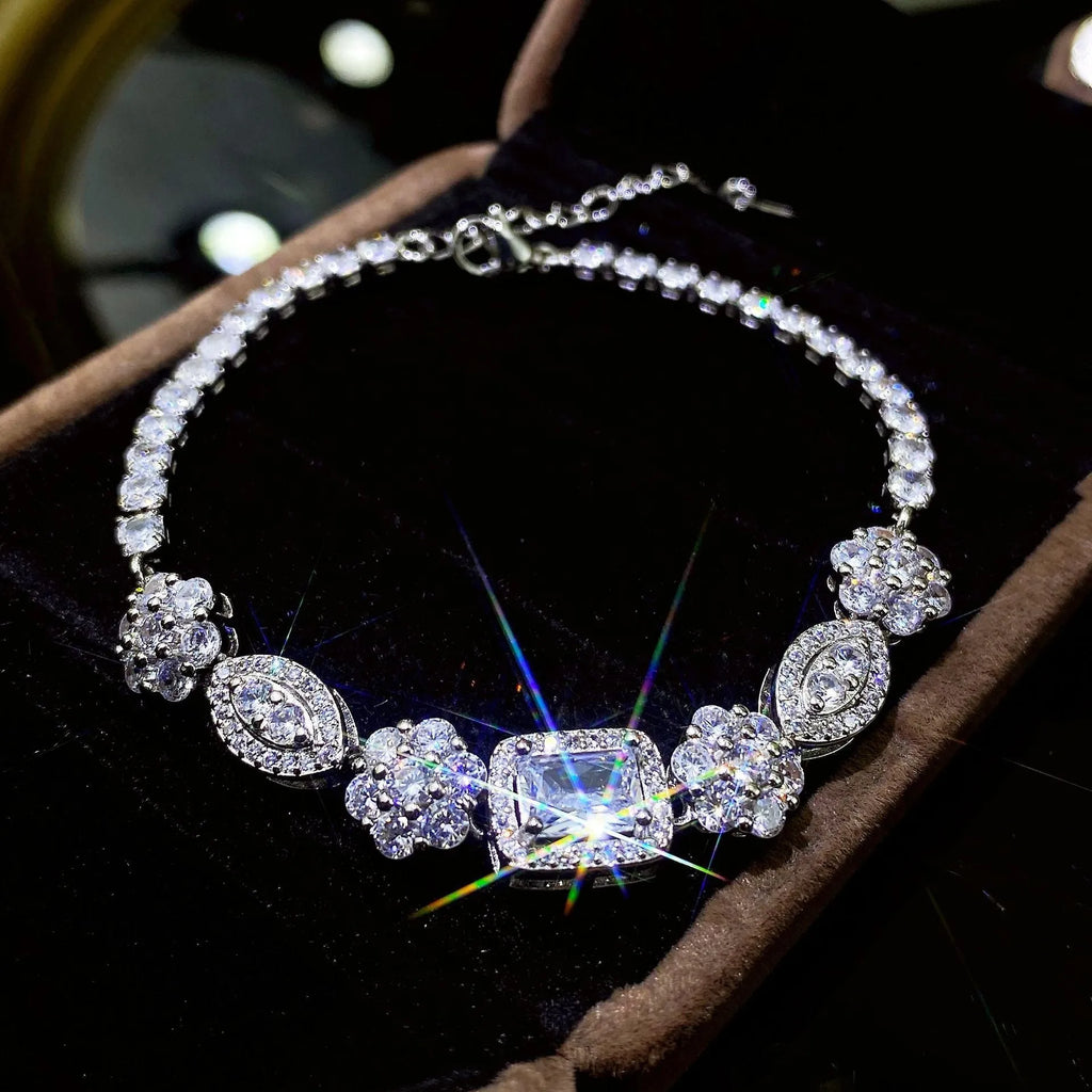Women's sterling silver-plated bracelet with zircon stones in geometry design, shown in two size options