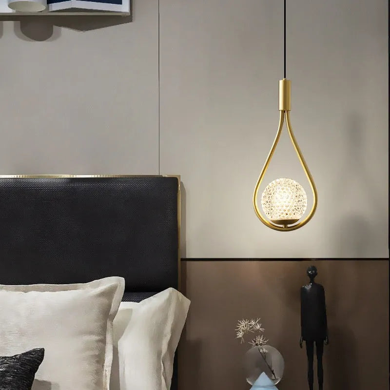 Modern copper bedside chandelier with honeycomb glass cover for bedroom ambient lighting