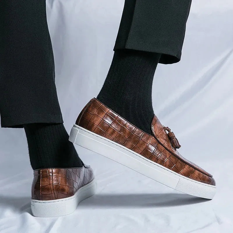 Men's black business casual sneakers with tassel detailing on artificial PU upper and rubber sole