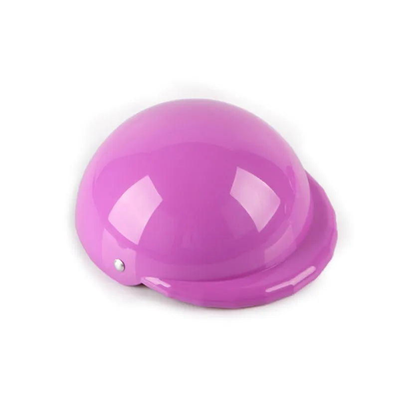 Solid colour plastic dog motorcycle helmet cap in Japanese South Korea style on a pink background.
