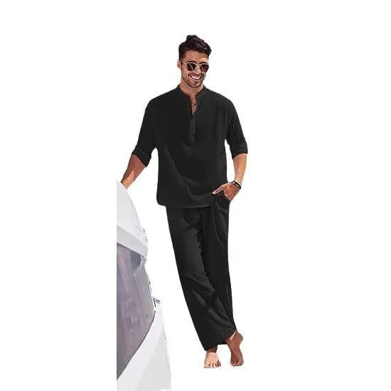 Men's casual cotton suit set in a solid colour, featuring a long-sleeved top and matching trousers.