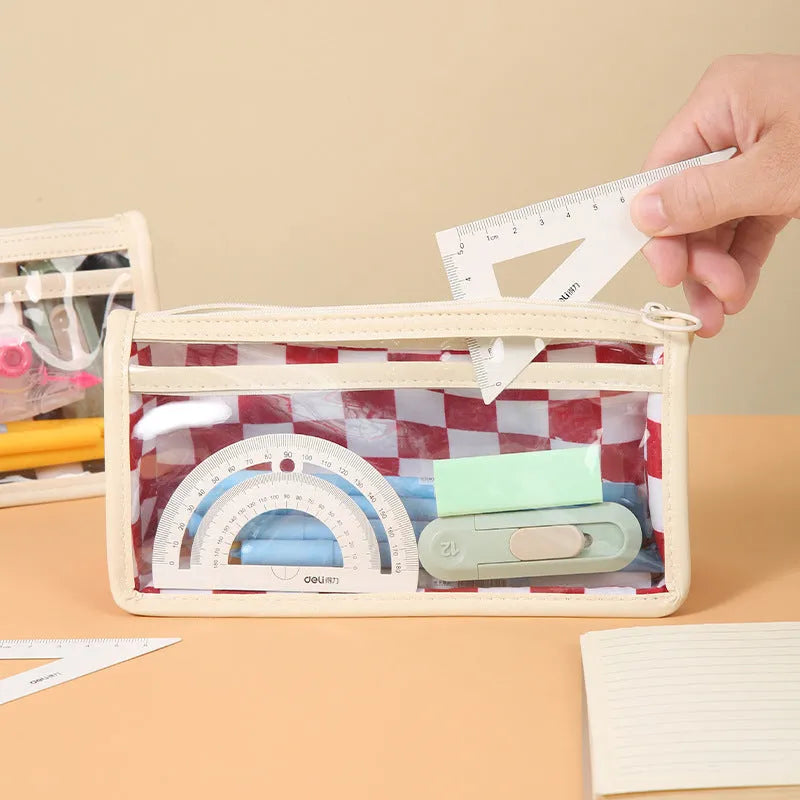 Large transparent PVC pencil case with a chessboard pattern, showing pens inside.