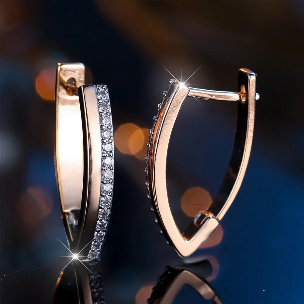 Geometric V-shaped women's clip-on earrings with champagne gold electroplating and white diamond accents