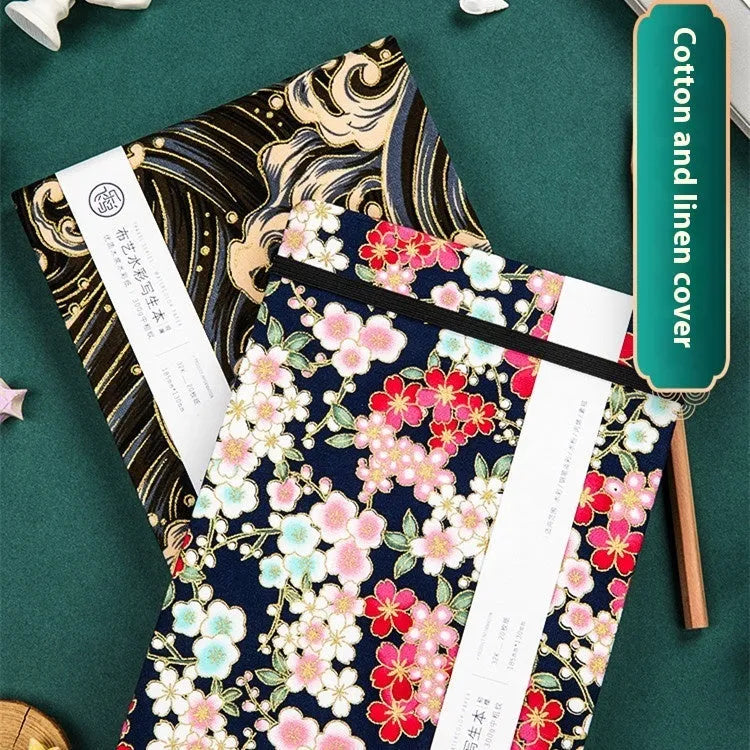 Feiluniao handmade fabric watercolour sketchbook with colourful themed cover, 185mm long.