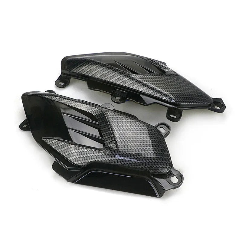 Pair of carbon fibre-style side lamp assemblies for Yamaha NMAX scooters with blue LED illumination option.
