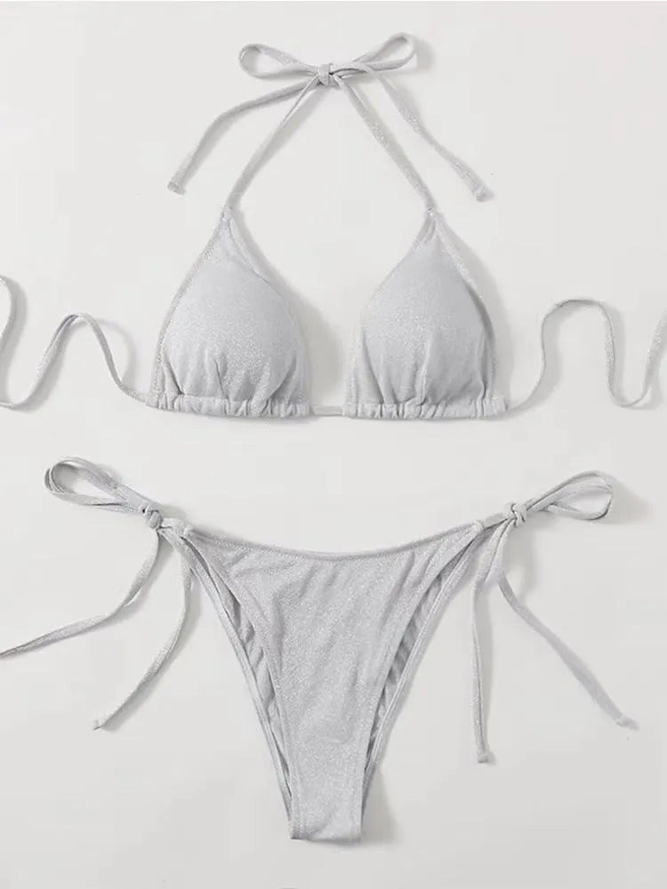 Women's khaki gold split bandage bikini swimsuit set on a model, showing the top and briefs.