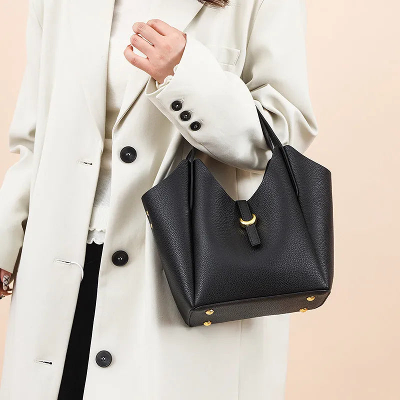 Genuine leather women's retro bucket handbag in beige colour showing sandwich pocket detail