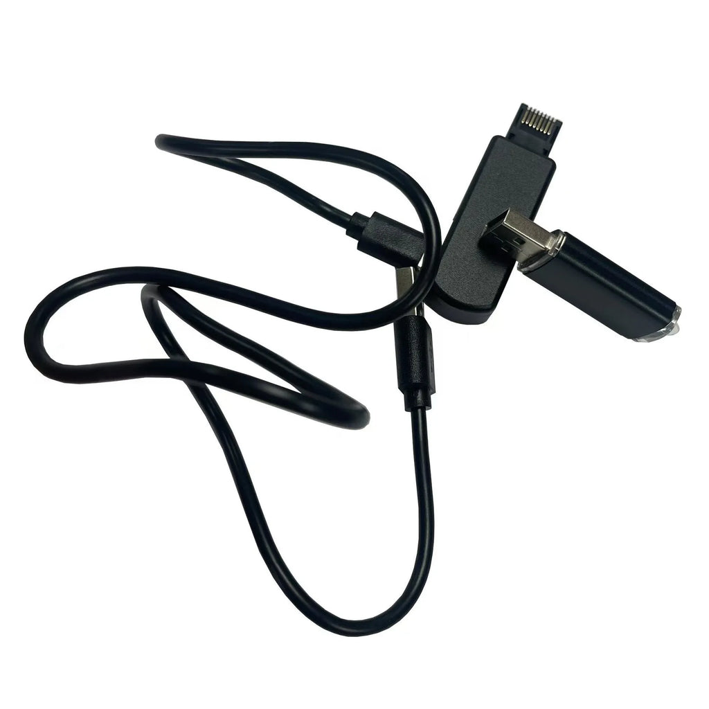 Black PS5 JB Tool USB adapter made of alloy and ABS plastic on a white background.