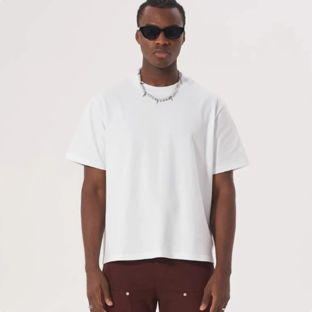 Men's loose fit pure cotton T-shirt in apricot colour on a hanger