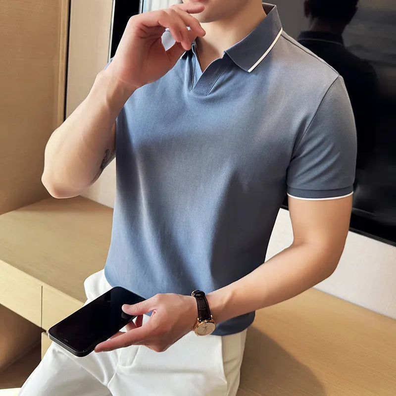 Men's solid colour short sleeve polo shirt in a cotton blend, shown in apricot colour.