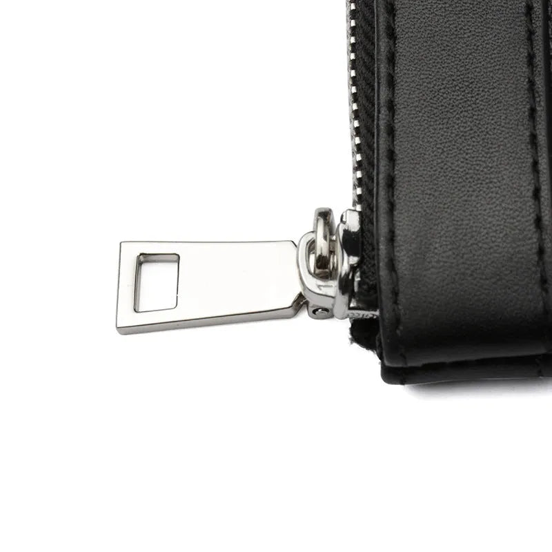 Black men's leather clutch wallet showing cowhide texture and 20cm x 10cm dimensions