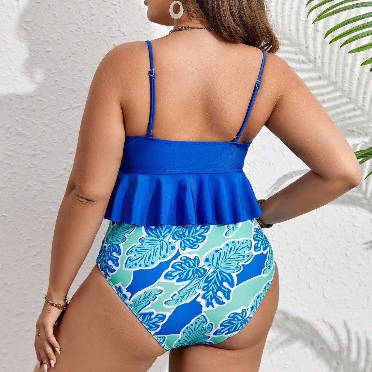 Blue plus-size bikini swimsuit set with top and briefs shorts on a mannequin.
