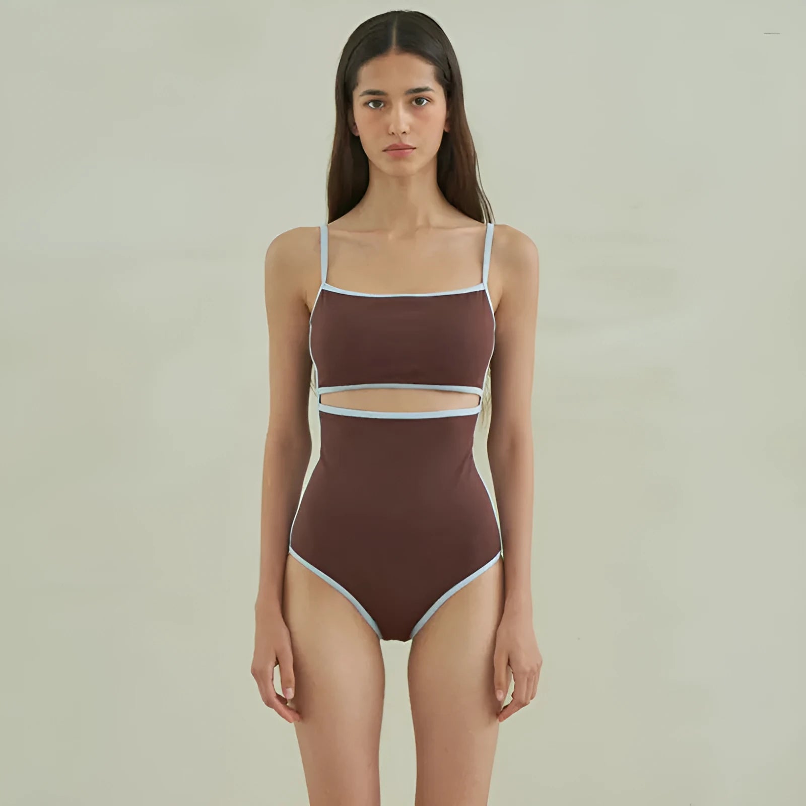 Brown nylon one-piece triangle swimsuit for women laid flat.