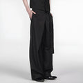 Black loose fit straight-leg trousers with adjustable waistband and single pleat detail