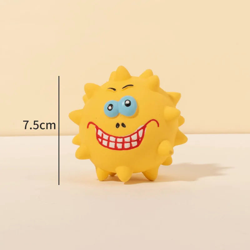 Four colourful squeaky dog balls with cute faces on natural latex rubber with bumpy dental-cleaning surface