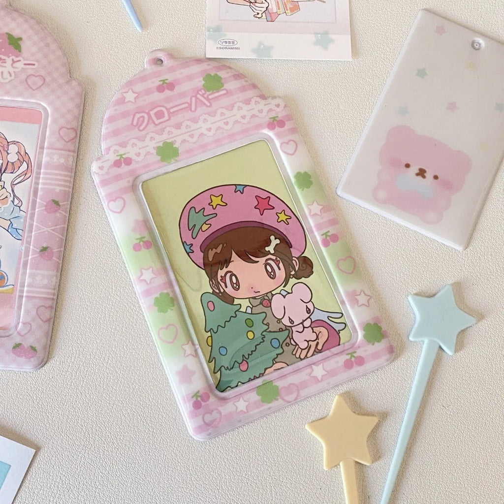 Cartoon strawberry and four-leaf clover PVC card holder pendants for ID and meal cards.