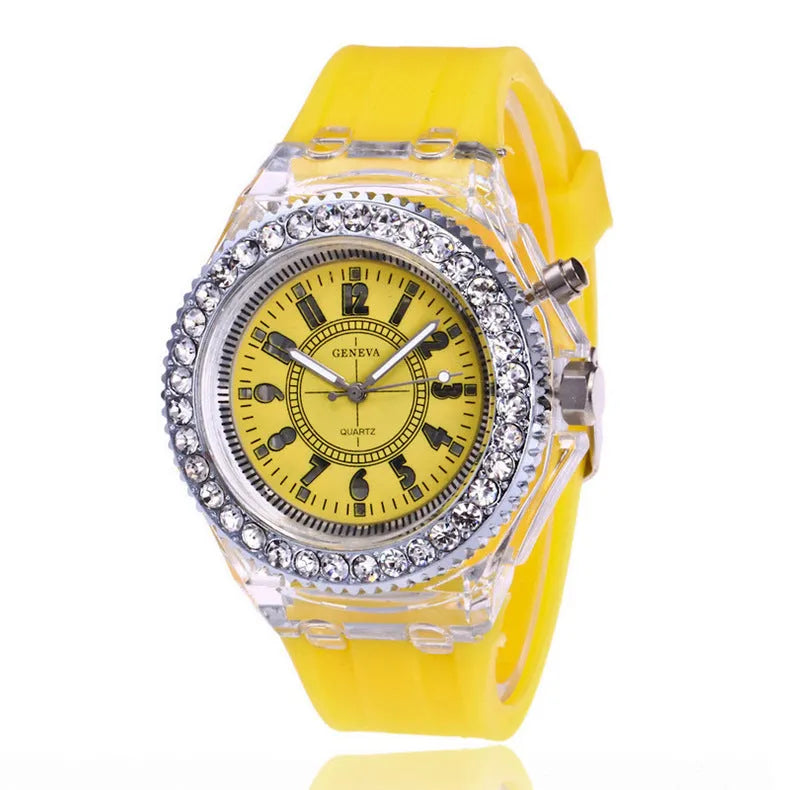 Women's LED luminous quartz watch with round 43mm alloy case and colourful silicone strap options.
