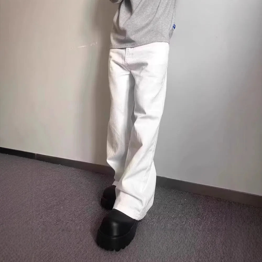 Men's white straight leg jeans with mid-waist zipper fly and loose wide leg cotton denim design