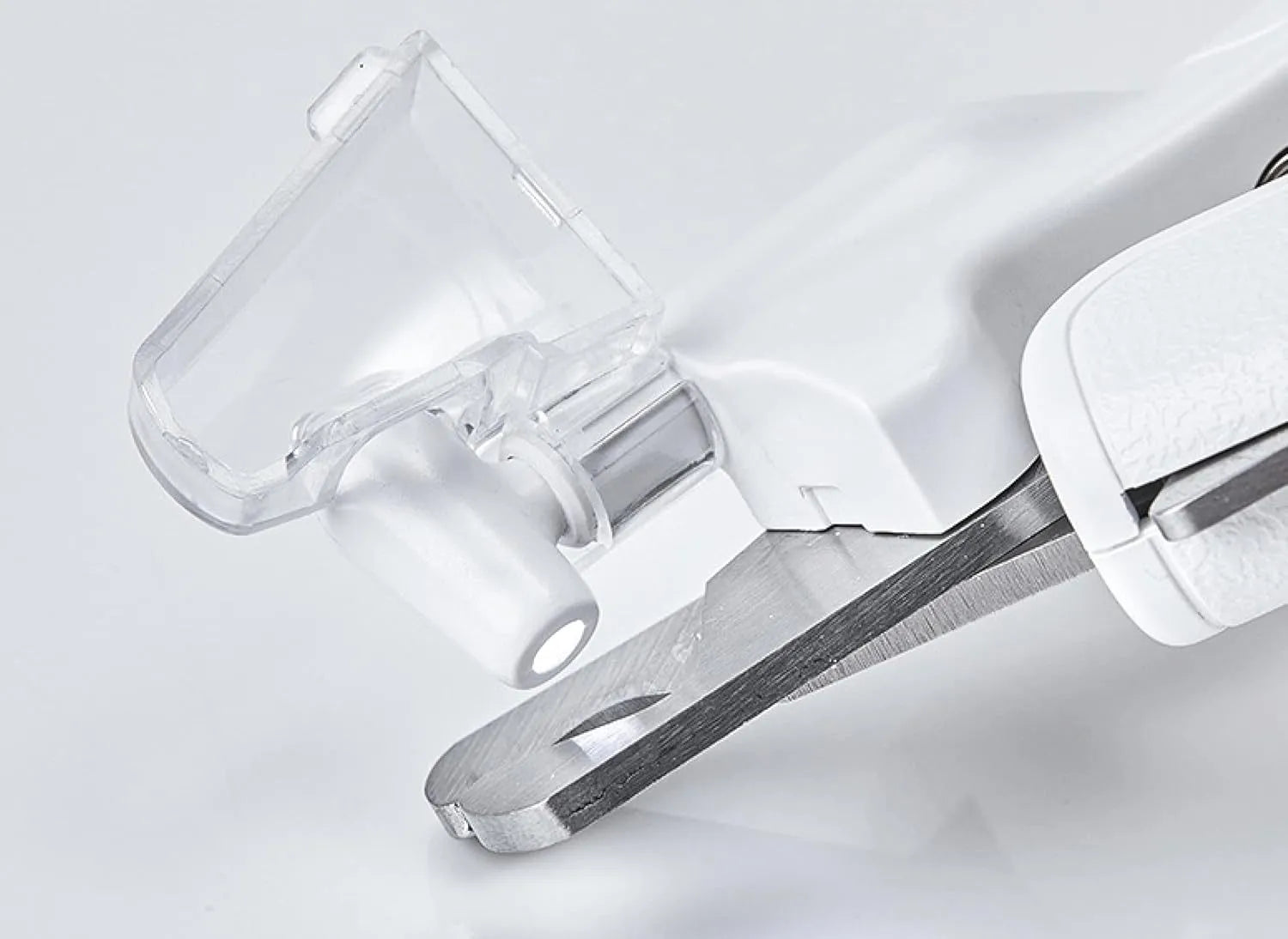 White LED pet nail clippers with open anti-splash guard and nail file on a solid colour background