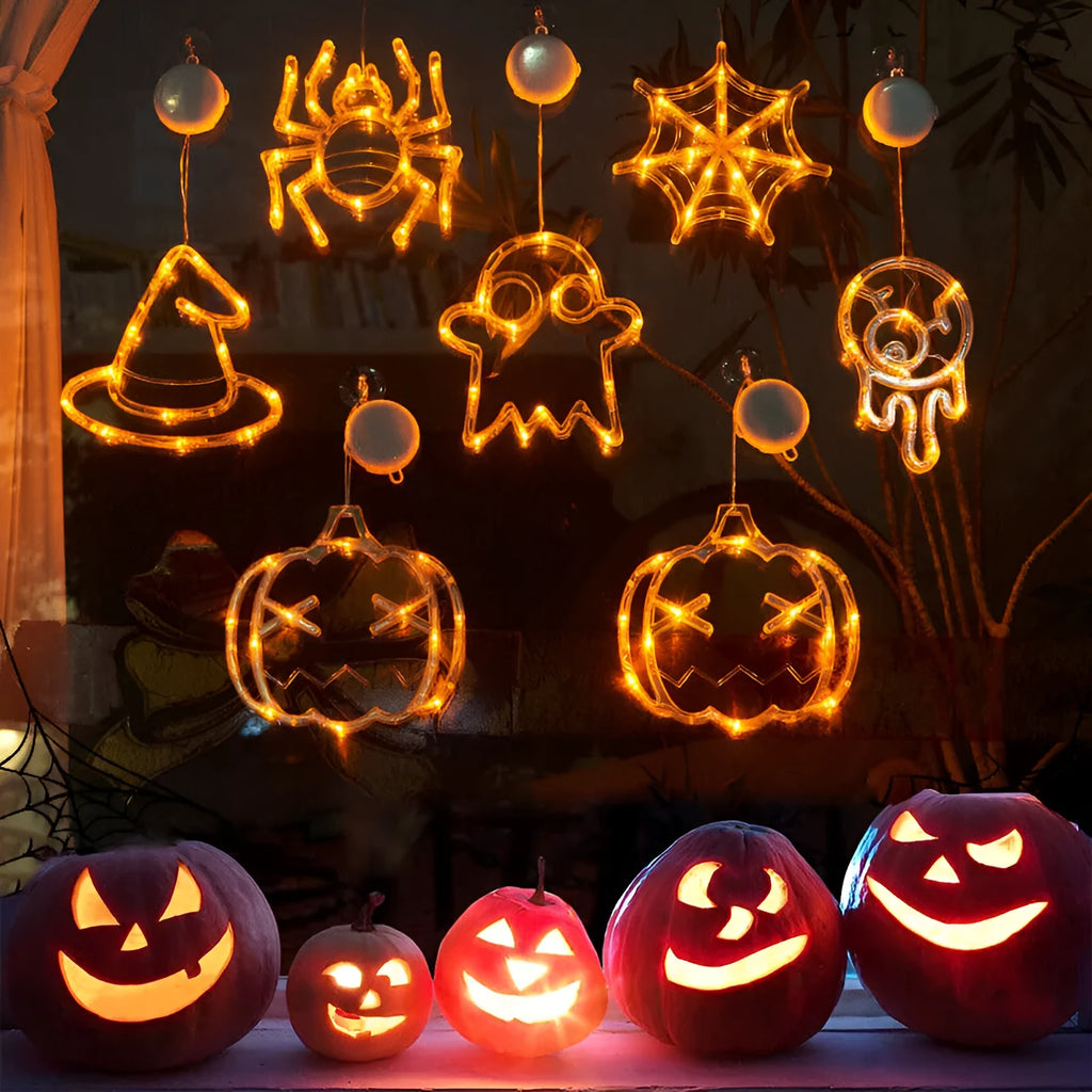 Set of seven battery-powered Halloween LED hanging lights with ghost, spider, and pumpkin designs for window decoration.