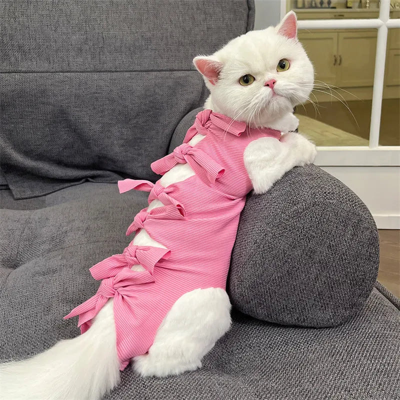 Lace-up polyester cat sterilisation recovery garment shown in blue, brown, green pineapple, pink, or purple