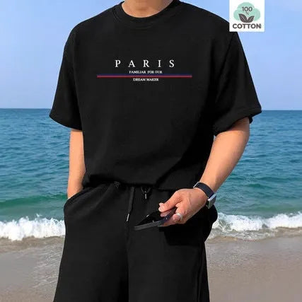 Heavyweight men's short-sleeve t-shirt with large letter print in apricot colour, showing loose fit.