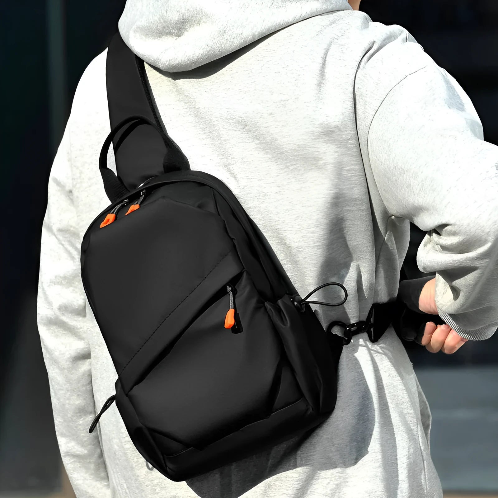 Men's black polyester crossbody bag with adjustable strap and simple casual styling