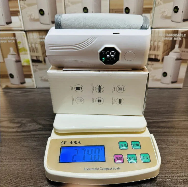 Grey and white portable car charger electric milk warmer for baby bottles