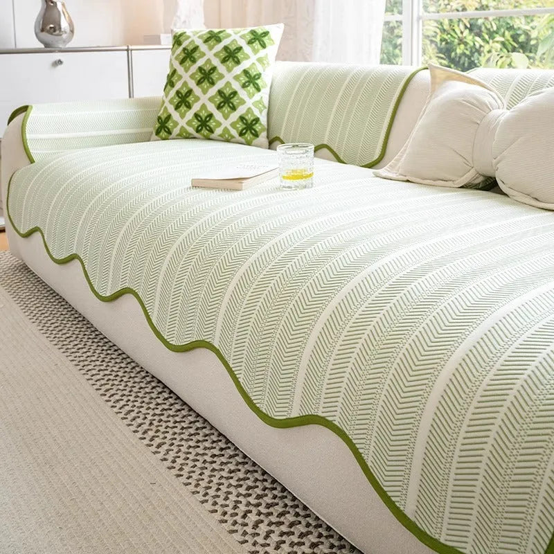 Ice silk sofa cover with non-slip design in jelly green colour on a three-seater sofa