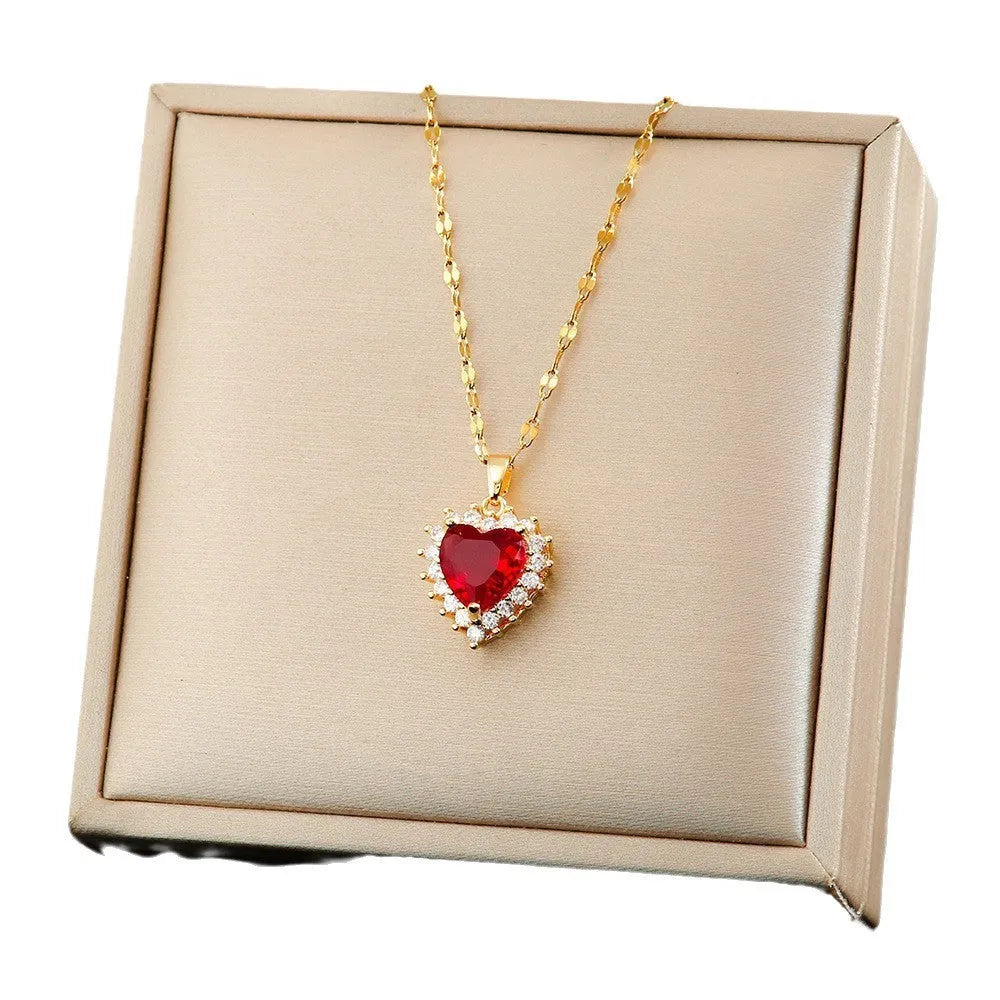 Gold red heart jewellery suit with mixed gem inlays on titanium steel necklace, earrings and ring